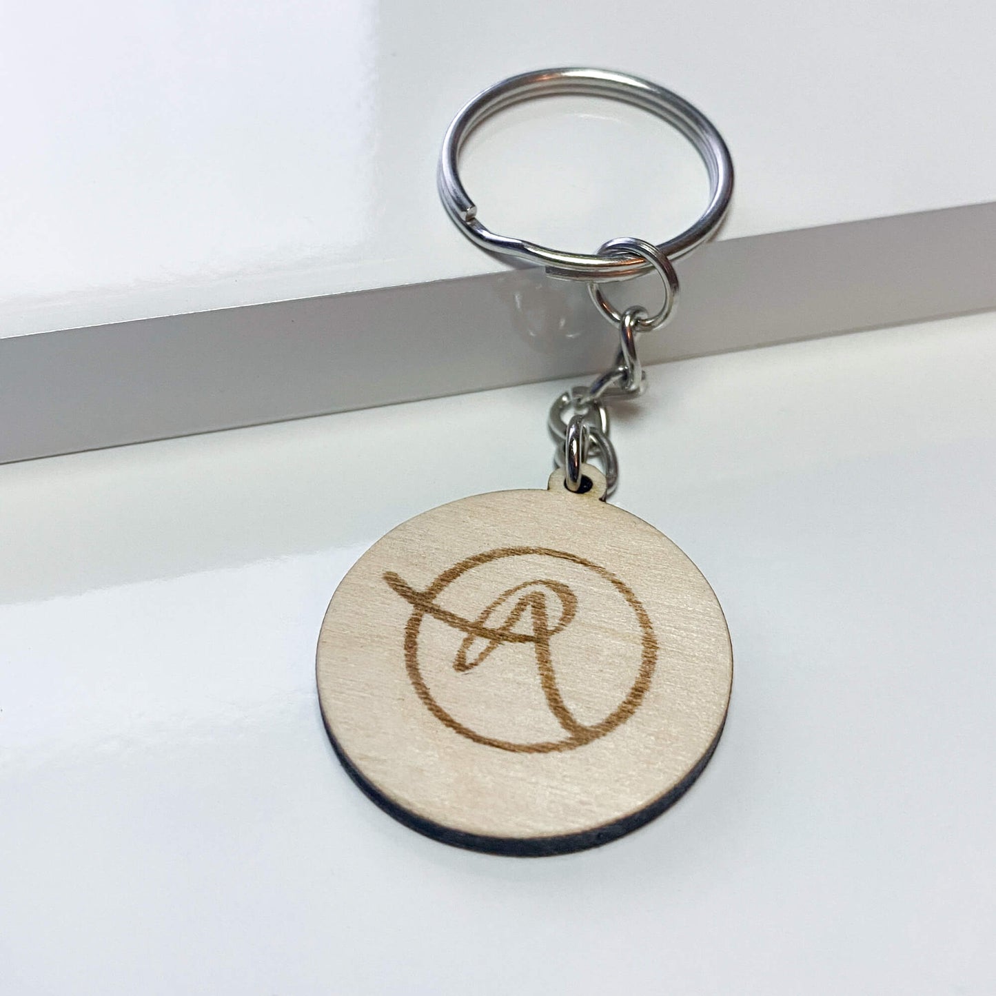 Round wooden keychain - engrave your motif