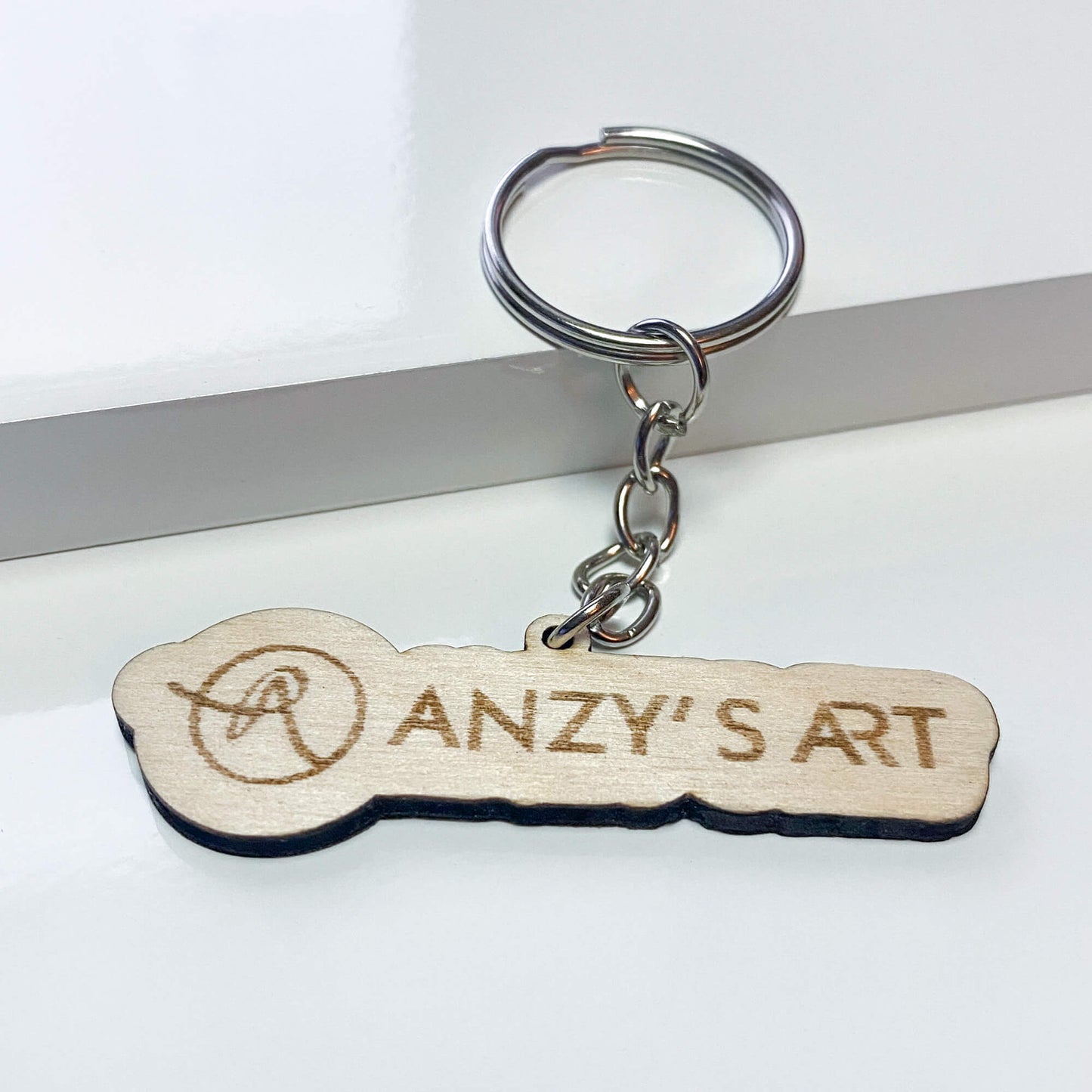 Wooden keychain with logo engraving - ideal for brands & events